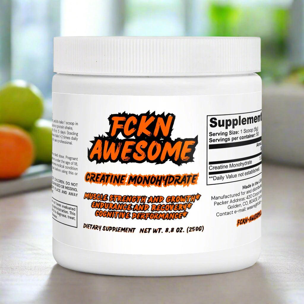 a white can of creatine monohydrate 250 gram with an orange logo FCKN AWESOME, on a kitchen table near fruits in front of a big sunny window