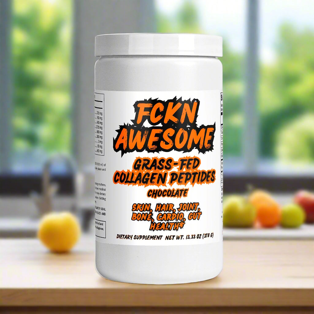 A white can of FCKN AWESOME's Collagen Peptides (chocolate) on a wooden table near yellow apple, in a modern kitchen, in front of a big sunny window and more fruits near a sink