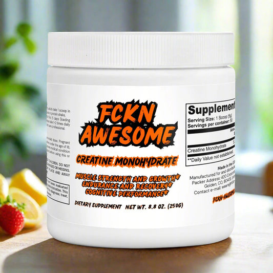 a white can of FCKN AWESOME's Creatine monohydrate powder (250 gram) in a modern kitchen on a wooden table near strawberries and lemons in front of a sunny window